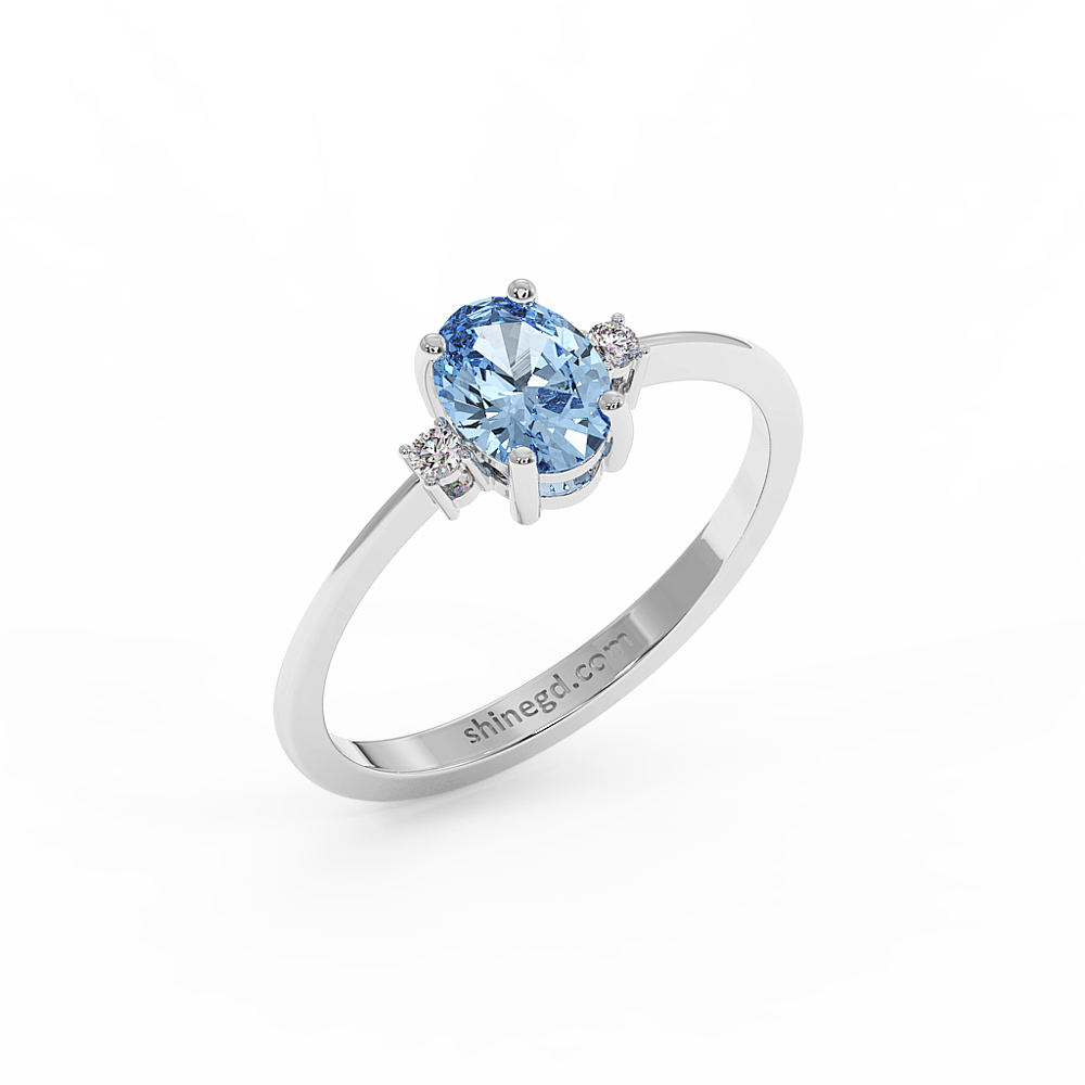 18K Gold Oval Blue Topaz with Diamond Ring