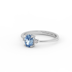 18K Gold Oval Blue Topaz with Diamond Ring